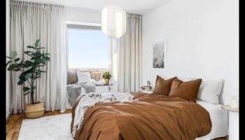 هل يمكنك اقتراح طرق لإنشاء غرفة نوم مستوحاة من الطراز الاسكندنافي باستخدام أفكار الديكور؟